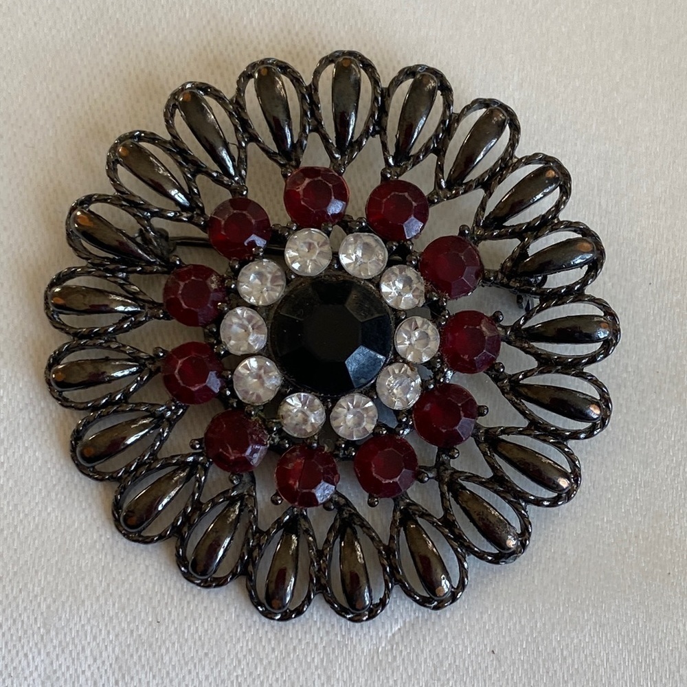Vintage Pin red, clear, and black crystals brooch. Pretty on a coat!